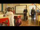 French education minister visits school near Paris