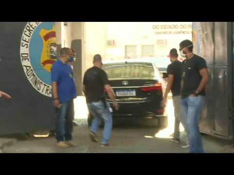 Police convoy reportedly carrying ex-aide to Bolsonaro's son arrives to prison