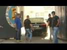 Police convoy reportedly carrying ex-aide to Bolsonaro's son arrives to prison