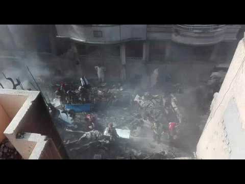 Top shot: Pakistan passenger plane crash in residential suburb
