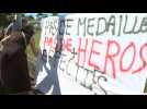 French healthcare workers demonstrate over government reforms