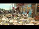 People pay tribute to George Floyd at Minneapolis makeshift memorial