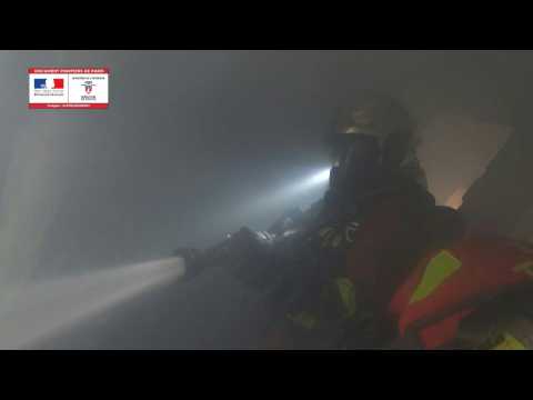 Firefighters' images from apartment building blaze in Paris