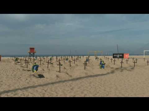 Graves dug on Rio's beach to protest against govt handling of pandemic