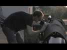 An astronomer looks at the sun in Kenya as solar eclipse begins