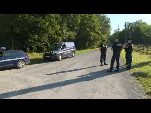 French troops stand guard as serial killer's home searched for schoolgirl's remains