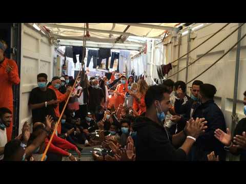 Explosion of joy aboard Ocean Viking as Italy allows migrants to land