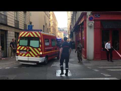Firefighters evacuate wounded from parcel bomb site