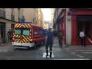 Firefighters evacuate wounded from parcel bomb site