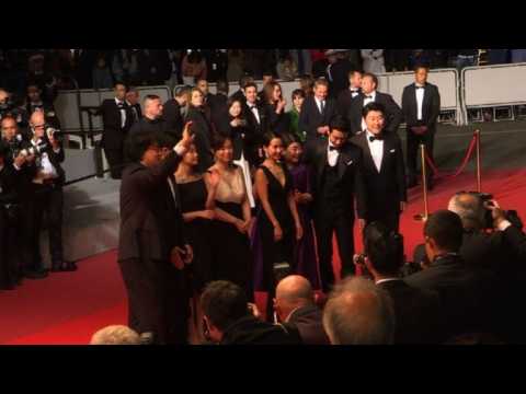 'Parasite' director and cast walk Cannes red carpet