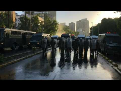 Chile police disperses protesters with water cannons, tear gas