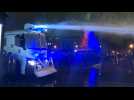Police use water cannon at Paris protest against security law