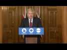 British PM says new virus strain transmitted far more easily
