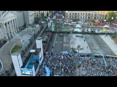 Face to face, pro-choice and anti-abortion activists gather outside Argentina's Senate before vote