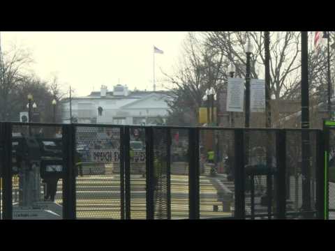 Security fences and concrete barriers line BLM Plaza in Washington, DC