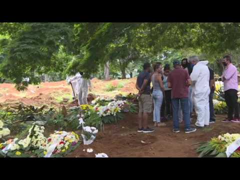 Burials at Sao Paulo cemetery after global virus deaths top 2 million