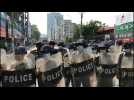 Riot police face off against protesters in Myanmar anti-coup protest