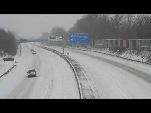 Snow storm disrupts rail and road traffic in western Germany