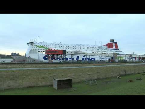 Trucks head from the Netherlands to Britain by ferry on first working day after Brexit