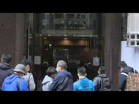 Hong Kong: Scene outside law firm where US solicitor among those arrested on security charge