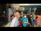 American arrested in Hong Kong on security charge escorted by police