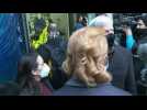 Assange's fiancee and WikiLeaks editor-in-chief arrive at court ahead of bail hearing