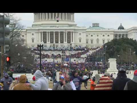 Pro-Trump supporters storm stairs of US Capitol