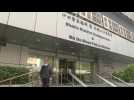 Images outside Hong Kong police station one day after mass arrests