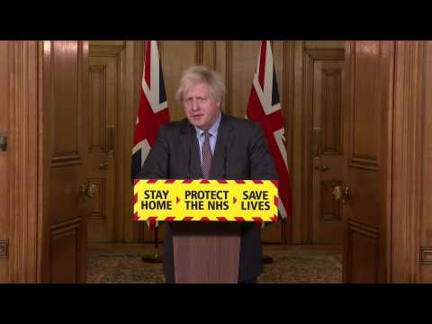 Johnson takes 'full responsibility' as UK deaths top 100,000