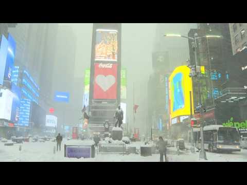 Snow blankets Times Square as New York braces for major snowfall