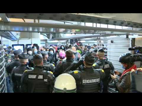 French security forces disperse protest against security bill in Paris