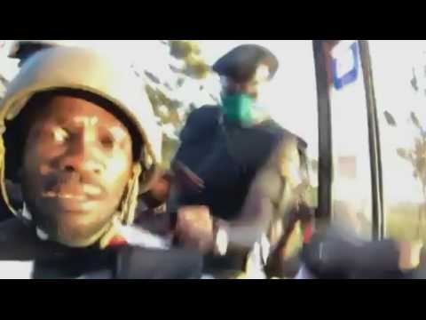 Uganda opposition figure Bobi Wine dragged from car by police