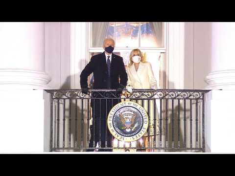 US President Biden watches fireworks from White House balcony