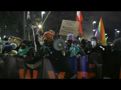 Protest in Warsaw as Poland implements near-total ban on abortion