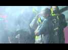 Sailing: Charlie Dalin sprays champagne after crossing finish line first