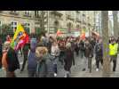 Demonstrators march in Paris against pensions reform