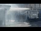 French police aim water cannon at pension reform protesters in Rennes