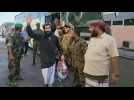 Huthi rebel prisoners arrive at Aden airport as prisoner exchange kicks off