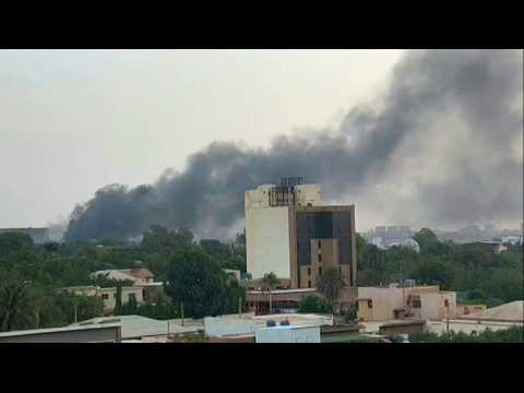 Smoke billows and gunfire echoes as fighting rages in Sudan's capital