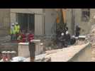 Investigators at the site of building collapse in Marseille