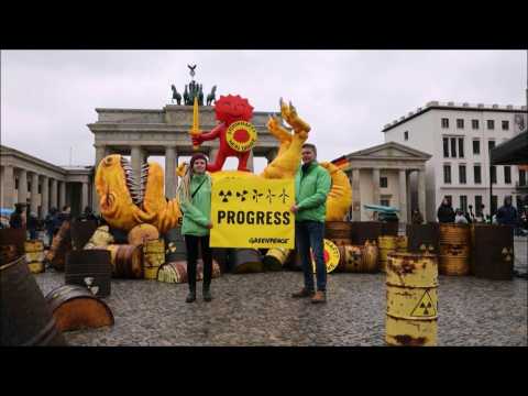 Greenpeace celebrates end of nuclear era in Germany with huge T.rex dinosaur