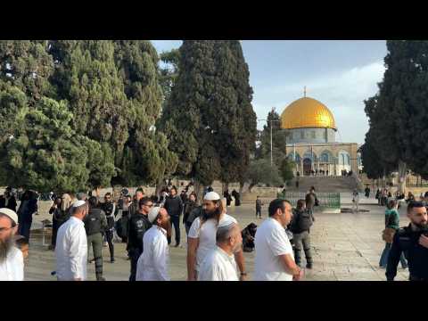 Group of Jewish people tours Jerusalem's al-Aqsa mosque compound