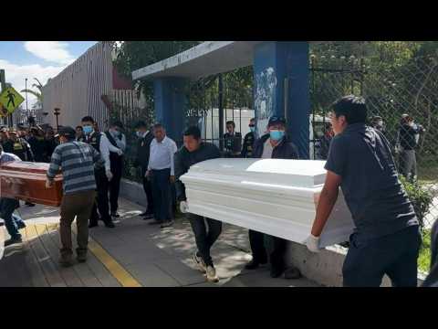 Police transfer coffins of 27 victims of Peru mining tragedy to morgue