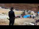 Dozens of migrants camp at US-Mexico border ahead of Title 42 lapse