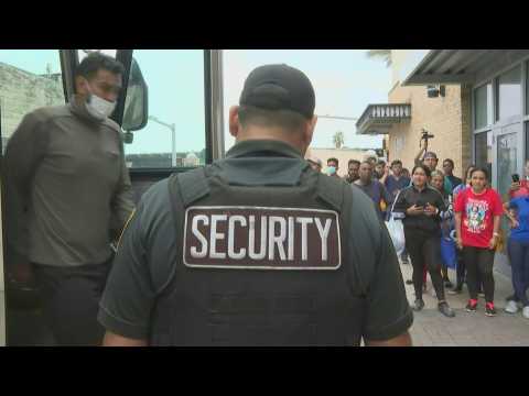 Migrants arrive from detention centers to reunite with family members separated at US border