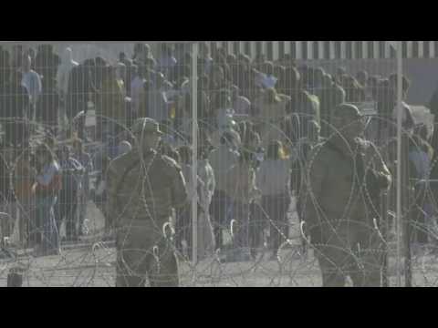 Soldiers stand guard at Mexico-US border as Covid asylum rules expire