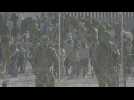 Soldiers stand guard at Mexico-US border as Covid asylum rules expire