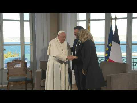 Brigitte and Emmanuel Macron meet Pope Francis