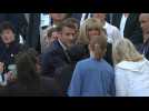 Macron arrives at giant mass celebrated by Pope Francis