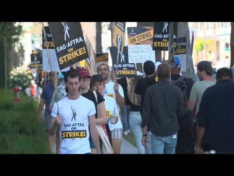 Hollywood actors and writers picket outside Netflix headquarters